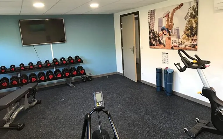 Salle de fitness de la résidence étudiante LMNP All Suites Study à PESSAC
