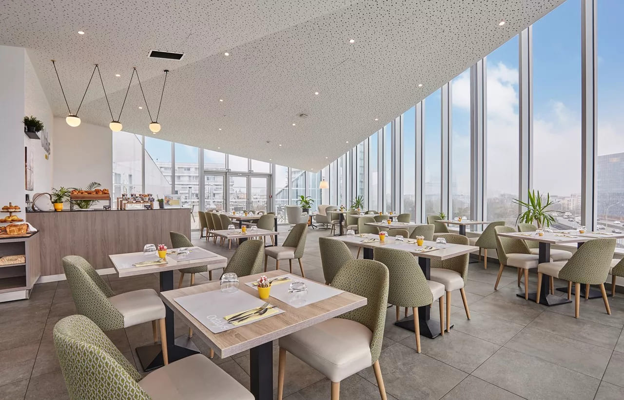 Salle de PDJ de la résidence de tourisme d'affaires en LMNP Appart'hôtel Odalys City à Paris 17e