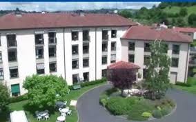 Vue extérieure bâtiment dans l'EHPAD résidence Coissy en LMNP à AURILLAC