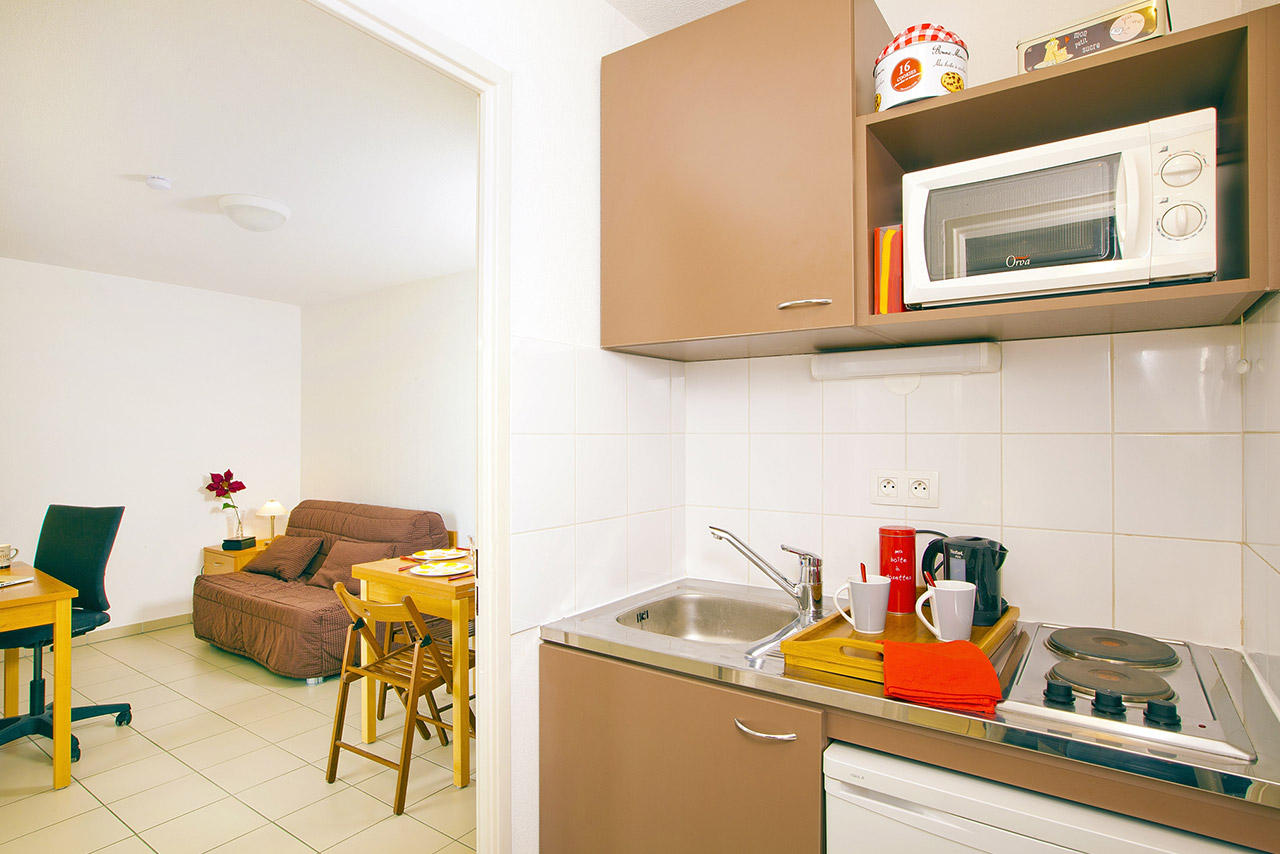 Séjour+kitchenette en résidence étudiante en LMNP Les Estudines à Marseille