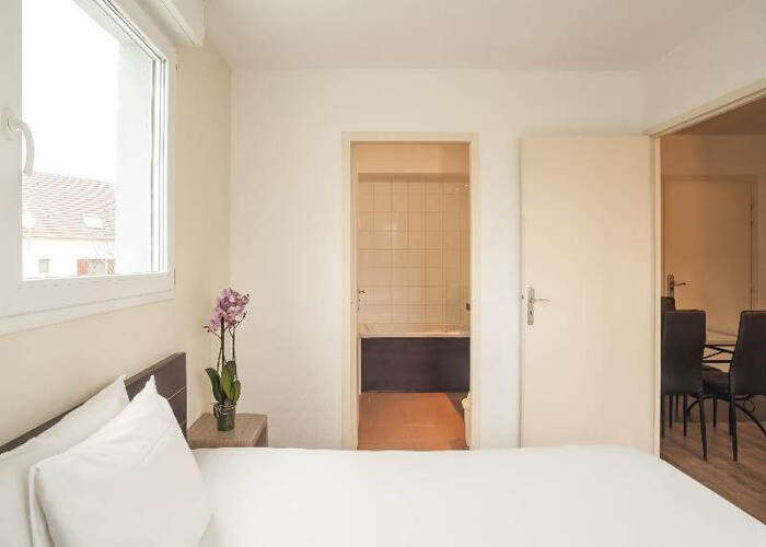 Chambre vue appartement dans une résidence LMNP tourisme affaires à Chelles City Résidence