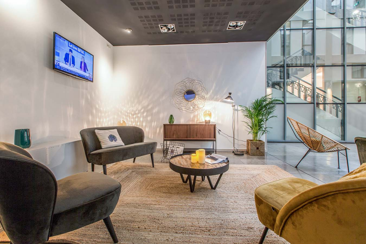 Espace détente de la résidence de tourisme d'affaires en LMNP Appart'City Part Dieu à Lyon